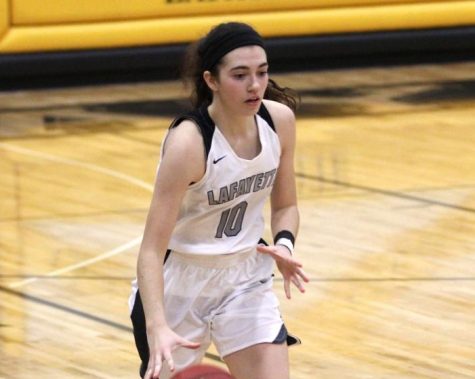 Girls basketball uses student section’s support to defeat rival