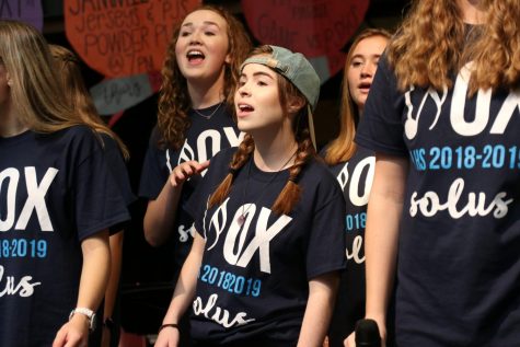 While performing with Vox Solus in Oct. 2018, senior Aden Black belts out a note. In addition to singing with Vox Solus, Black is also a member of Tuesday Night Rock Band.