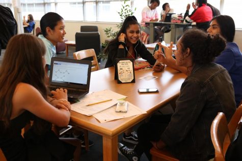 Students work on homework in the library during the new Flex Time.