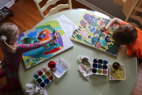 Children of photography teacher Meghan O'Donnell paint during quarantine