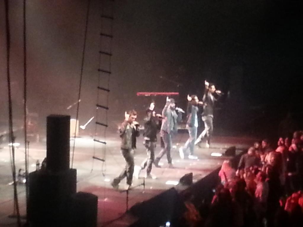 The Backstreet Boys dance like old times for the audience.
