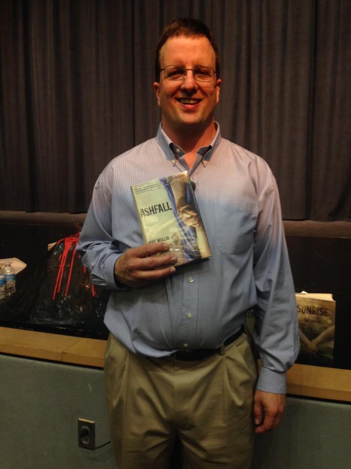 Author Mike Mullin and one of his books from the Ashfall series at Lafayette on April 17.