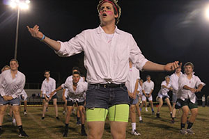 Male Escadrille performs at half-time of the Powder Puff Game.