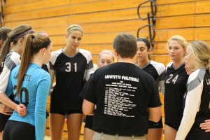 Coach Zach Young goes over the game plan with the team before a game against Kirkwood. Lafayette won this match 25-19, 25-6. 3 days later the team would compete in the MO/KAN tournament.