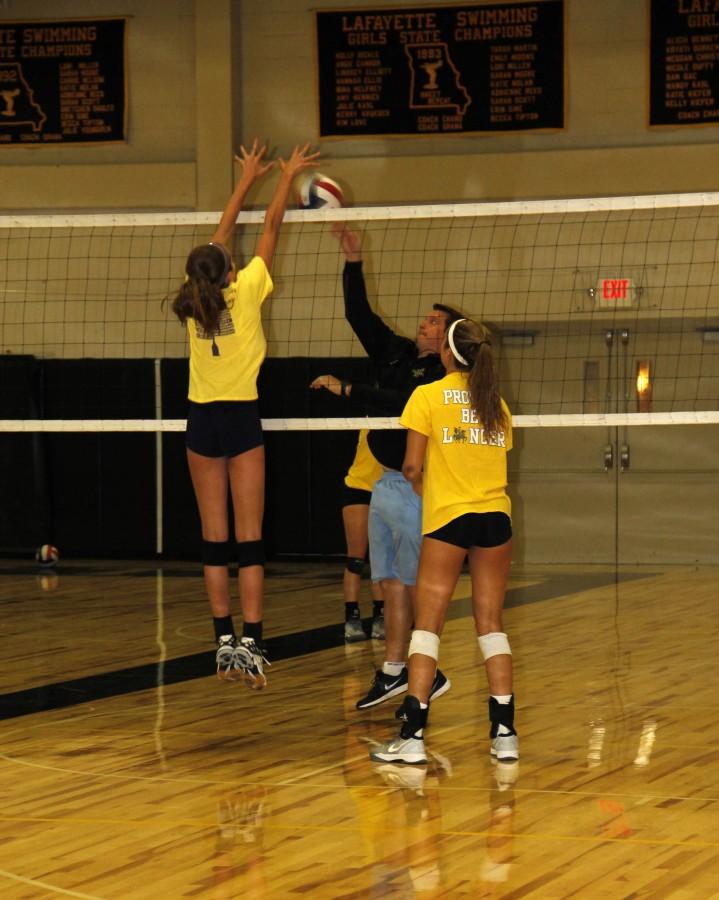 Girl's varsity volleyball practice blocking skills