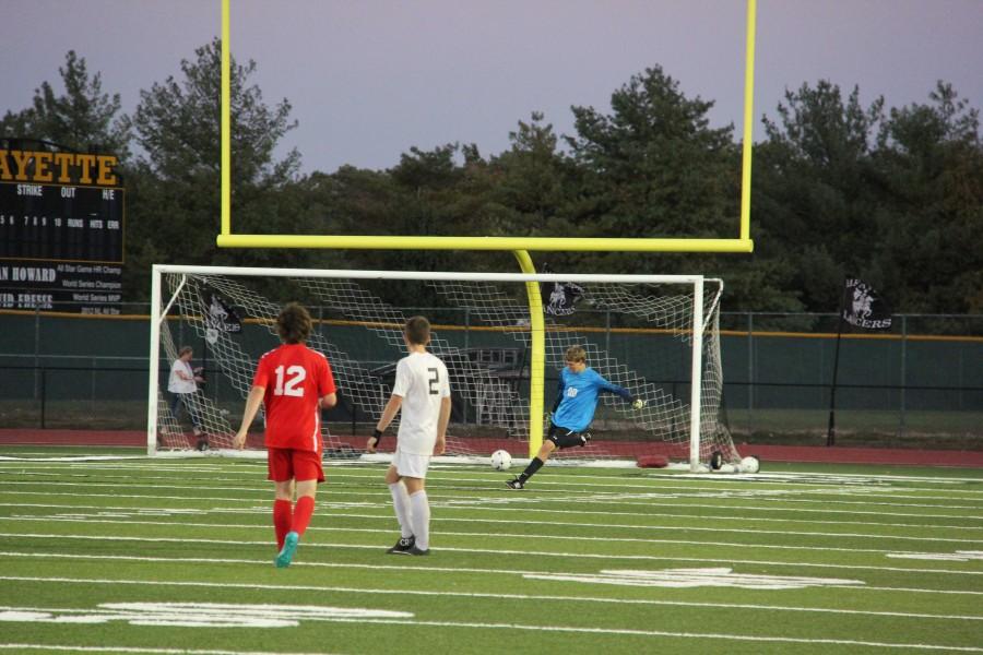 Goalkeeper Scott Caraway goal kicks in a game against Fox. Lafayette won this contest 4-0. 
