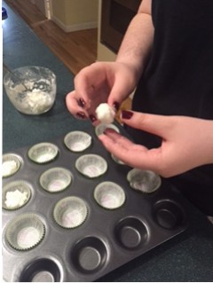 Place rolled balls of the mixture into muffin tins in a mini muffin tray.