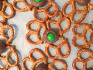 Once the Rolo is partially melted in the oven, top it off with a green M&M. 
Enjoy!