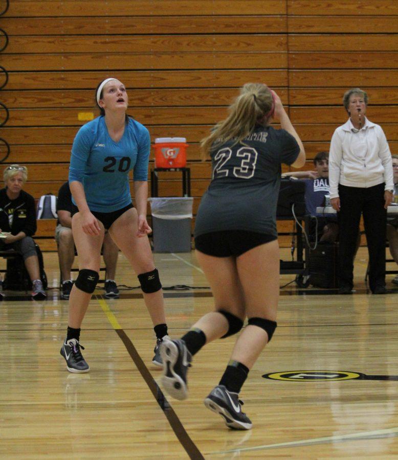 Emelie Orlando (23) sets the ball up for Kailey Kantouth (20) in a game against Borgia.