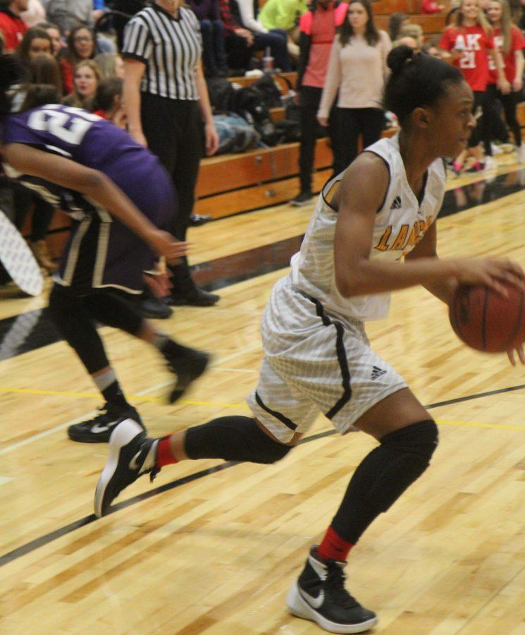 Jordyn Terry drives by an opponent in a game last year.