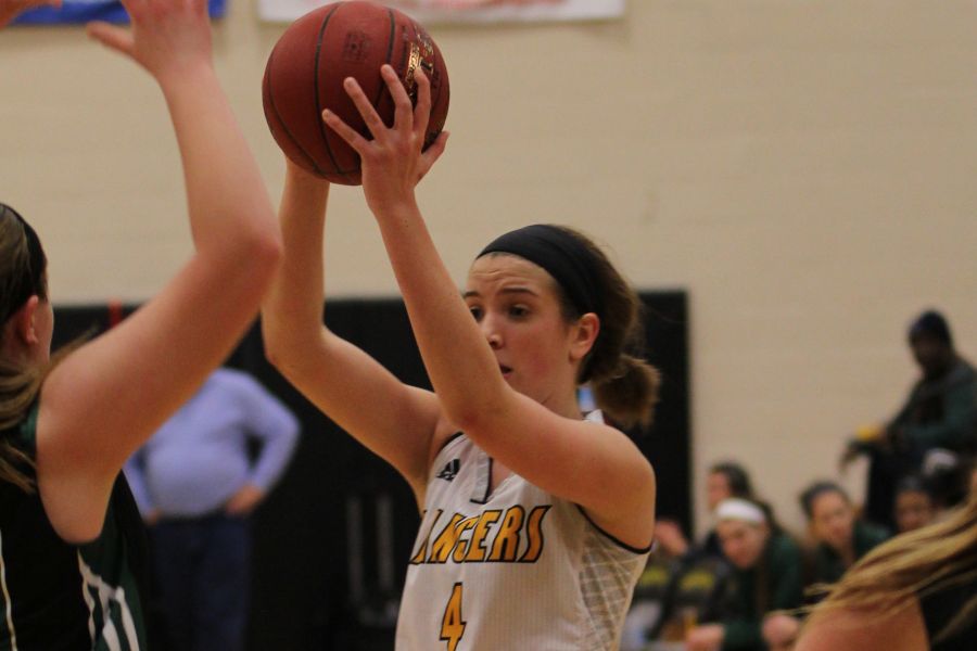 Tara Robbe (4) looks for an open teammate in a game against Mehlville. She scored 13 points and racked up five rebounds in a 65-36 victory.