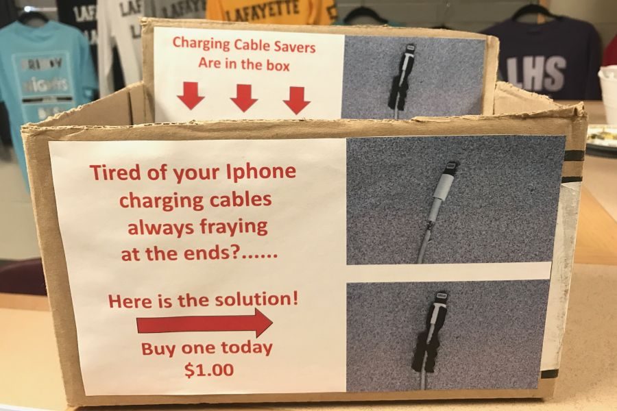 Engineering+class+sells+charger+savers+in+school+store
