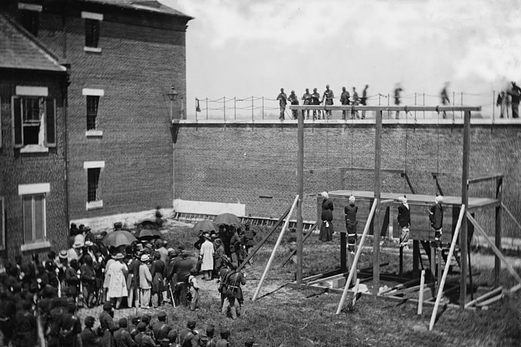 Four convicted conspirators of the Lincoln assassination, Mary Surratt, Lewis Powell, David Herold and George Atzerodt are hanged July 7, 1865.