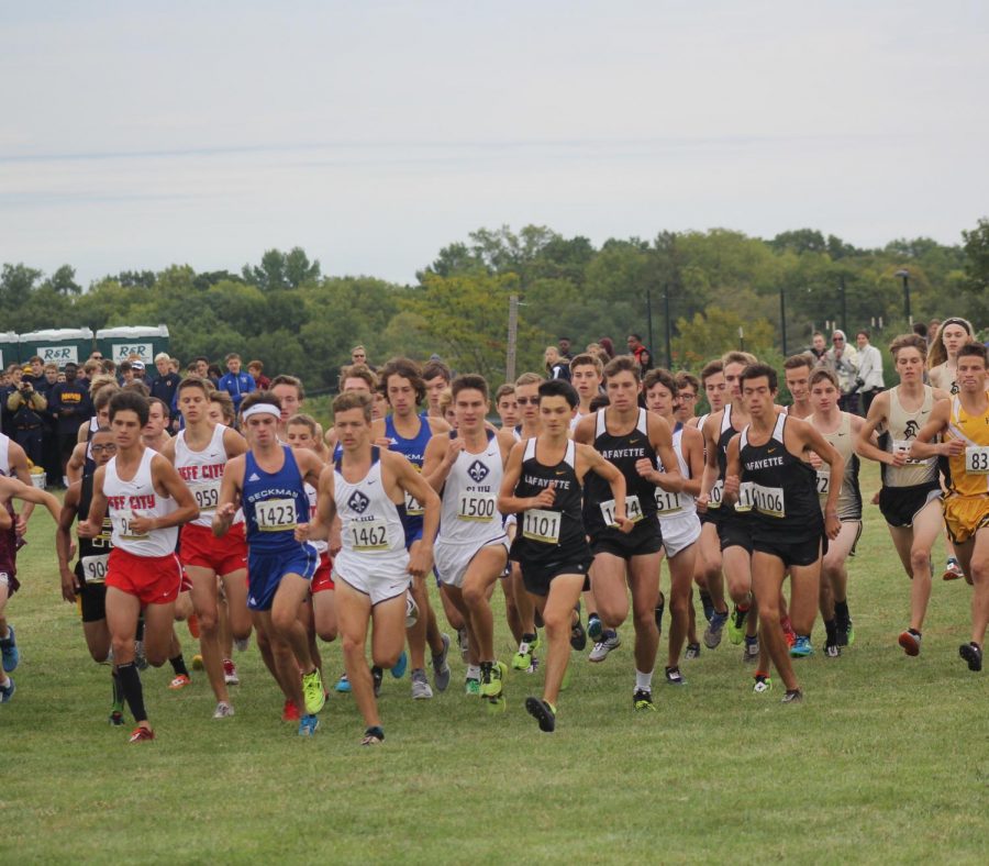 At the start of the Sept. 29 race at Living Word Church, the boys cross country team fights to get to the front of the pack. The Lancers placed sixth overall at the Parkway West Invitational, and senior Harrison Brown places third overall. 