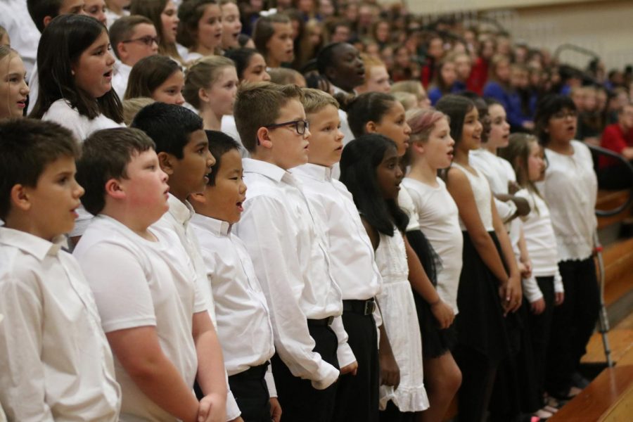 Elementary school choir students from the Lafayette zone combined into one choir for the Music in Our Schools concert (MIOS) to perform for the audience.