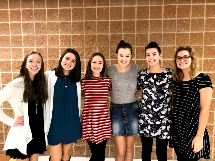 Seniors Lindsay Armstrong and Rachel Blankenship,  Sara Morgenthaler and Megan Scholl, juniors, and Lily Gregory and Sophie Arceneaux, sophomores, wear dresses to support the fight against human trafficking.
