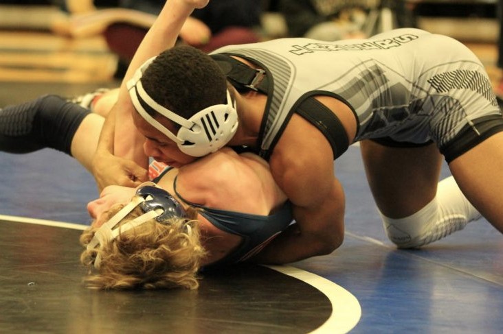 During a wrestling match at LIndbergh on Jan. 16, senior Jaylen Carson fights to pin his opponent. 