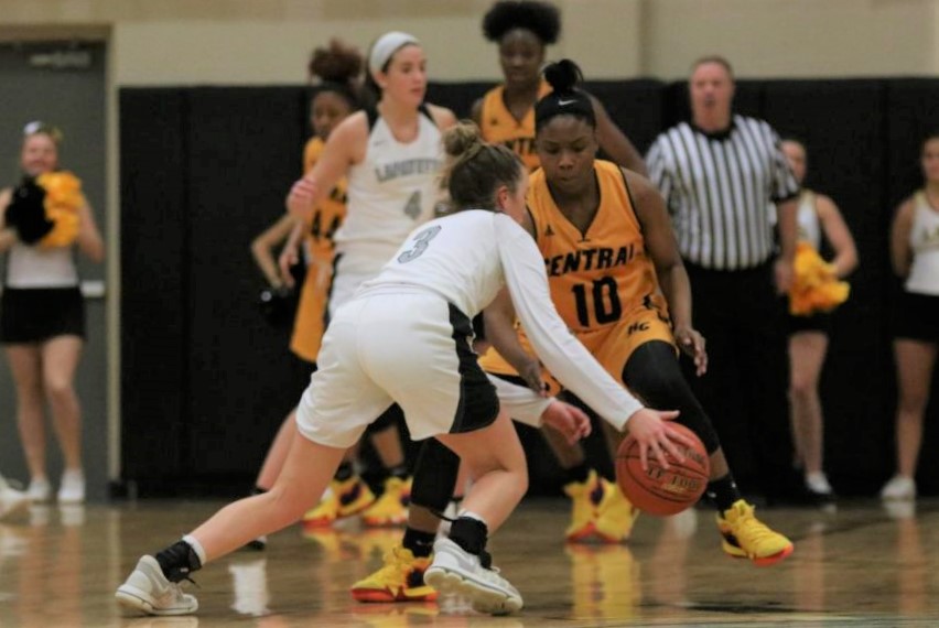 During the Dec. 9 basketball game, senior Sydnie Wolf drives past a Hazelwood Central defender. 
