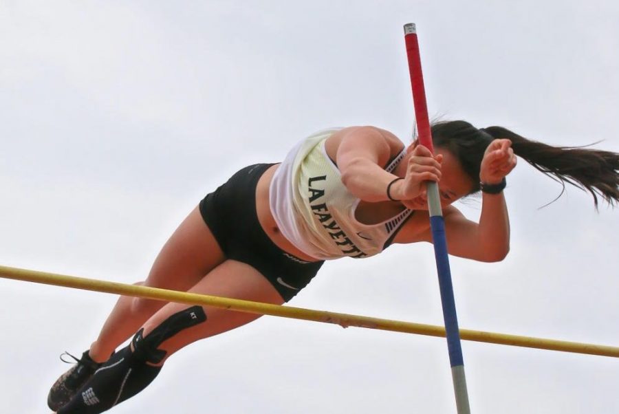 At the Parkway/Rockwood Meet on March 30, senior Ellie Schilling flies through the air after releasing her pole. I love the feeling of when every little aspect of the vault, of which there are many, just appears to align and you’re seemingly flying through the air, Schilling said. 
