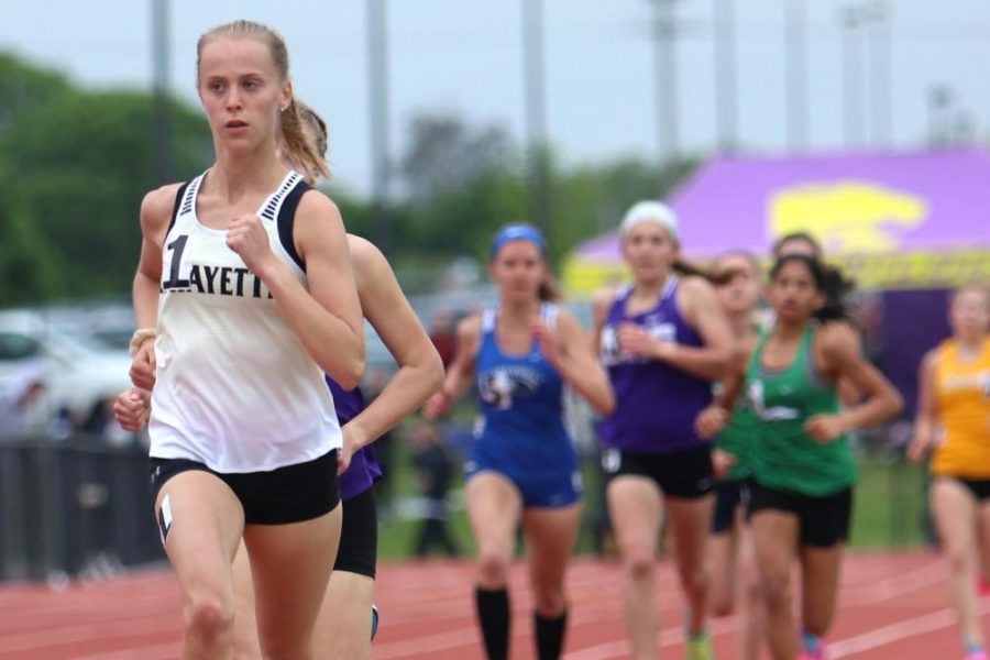 During the 1600 meter run in the Suburban Yellow Conference Meet at Lafayette, senior Anna Karner leads the pack. Karner won the race in 5:10.02 in addition to helping the 4 x 400 relay team to a third place finish.