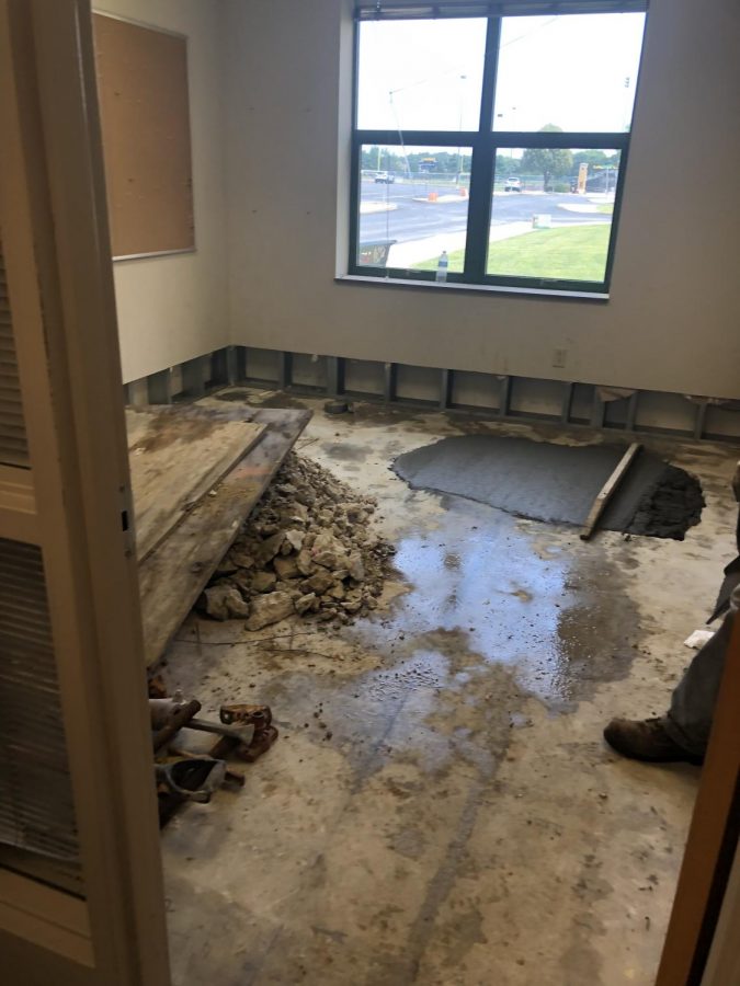 After crews worked through the evening Aug. 17, the floor and baseboards of the Activities Office floor are stripped, Aug. 18. The Activities Office will be relocated to Room 114.