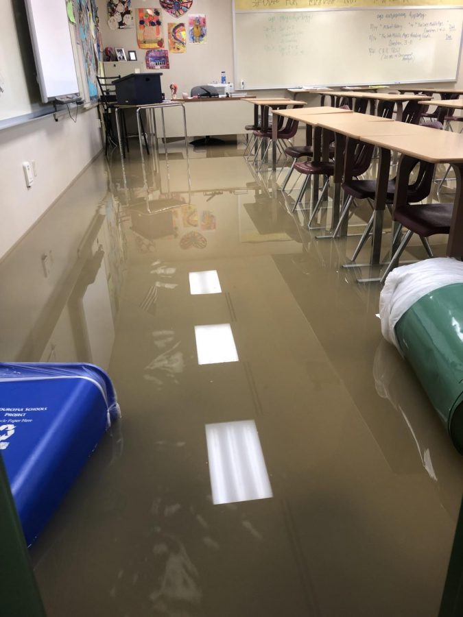 Standing water settles in Room 183 before it is pumped out by CATCO crews, Aug. 17. Classes in Room 183 will be relocated to Room 004 except for 5th Hour, which will be relocated to Room 137A.