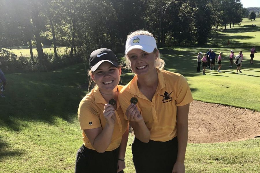 Junior Brooke Biermann and sophomore Jenna Loveless pose with their medals after the District Tournament. Biermann later went on to win State at the Class 2 MSHSAA State Tournament.  