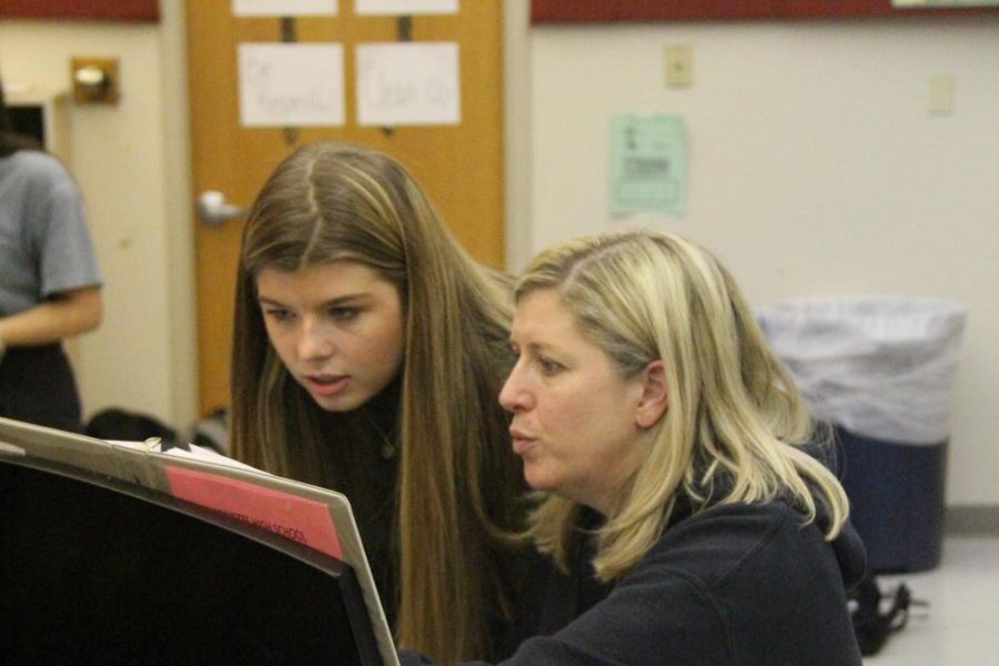 At a rehearsal for Footloose, sophomore Gracie Mauer practices a song with choir teacher Christy Schaffer. Mauer is playing Lulu Warnicker in the Feb. 6-8 production.