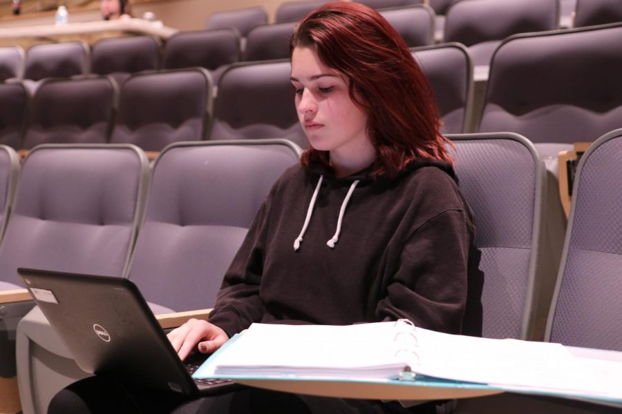 Senior Elizabeth Elliott works as a stage manager during a rehearsal for a Lafayette Theatre Company production. 