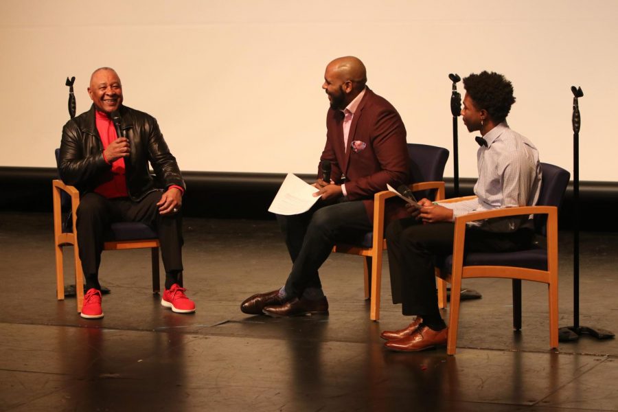 Pascal Beauboeuf, host of The Pascal Show, assists in asking questions at the Black History Month presentation in the Theatre on Feb. 21. Hall of Famer Ozzie Smith attended the event by invitation of his niece, sophomore Claireece Cross. 