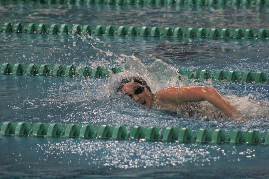 In a swim meet against Marquette High School on Jan. 28, sophomore Dylan Moulton competes in order to get her fastest time of the season. The Lady Lancers ended up losing the meet 110-76.