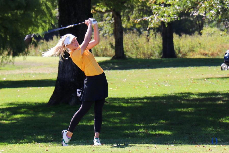 In a match, senior Brooke Biermann drives the golf ball up the course. Biermann placed second at the Missouri State High School Activities Association (MSHSAA) State tournament, shooting three under par in inclement conditions. Biermann's score, along with others, helped boost Lafayette to fifth place overall in the tournament.