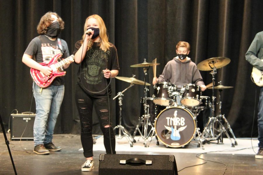 Junior Rachel Vishion performs on Dec. 15 during the filming of a music video produced by Tuesday Night Rock Band. Due to the restrictions put in place, the band has been forced to find new ways of sharing their music.