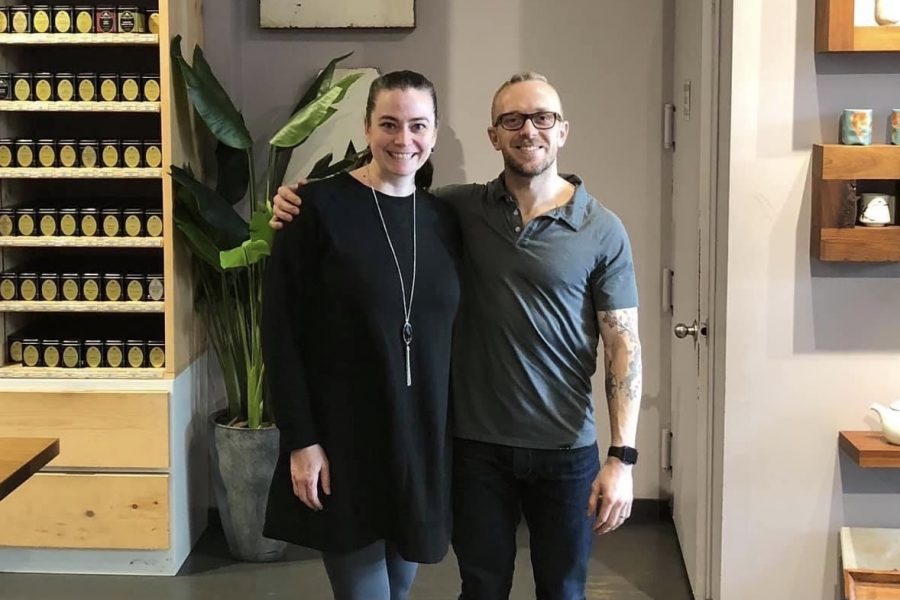 Family and consumer sciences teacher Lauren Arnet smiles with Emeric Harney at Harney & Sons SoHo, a fine tea company, in New York.