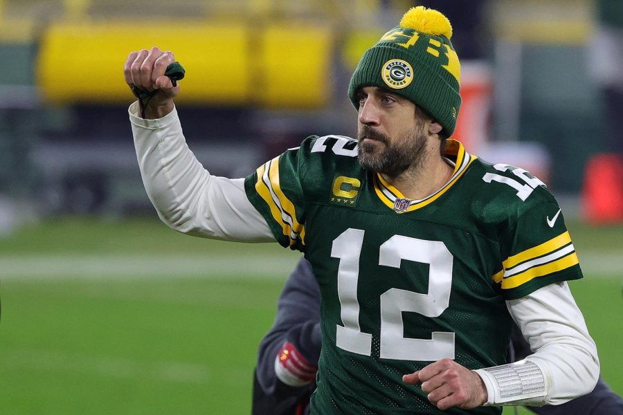 Aaron Rodgers #12 of the Green Bay Packers leaves the field following the NFC Divisional Playoff game against the Los Angeles Rams at Lambeau Field on Jan. 16, 2021 in Green Bay, Wisconsin. The Packers defeated the Rams 32-18. 