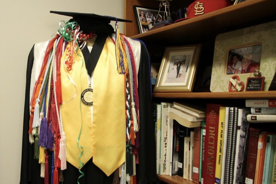 In Assistant Principal Timothy Joness office, a mannequin stands with an assortment of honor cords that Lafayette offers. 