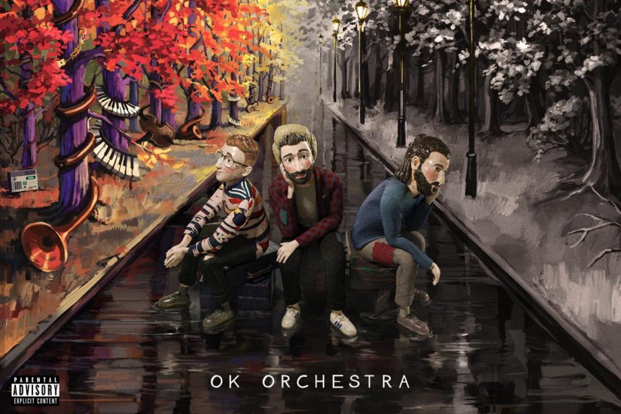 The album cover for AJRs OK ORCHESTRA features miniaturized  figures of the bands members: Jack Met, Ryan Met and Adam Brett Met.