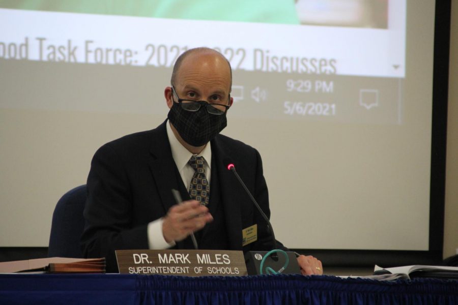 Superintendent Mark Miles addresses the board and patrons during the May 6 Board of Education meeting. At the meeting, over 30 patrons spoke their opinions about recent curriculum controversy with the meeting lasting about three hours.