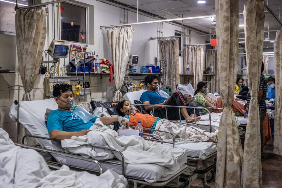 Patients who contracted the coronavirus lie in beds while connected to oxygen supplies inside the emergency ward of a Covid-19 hospital on May 03, 2021, in New Delhi, India. India recorded more than 360,000 coronavirus cases in one day for the 12th day in a row as the total number of those infected according to Health Ministry data neared 20 million.