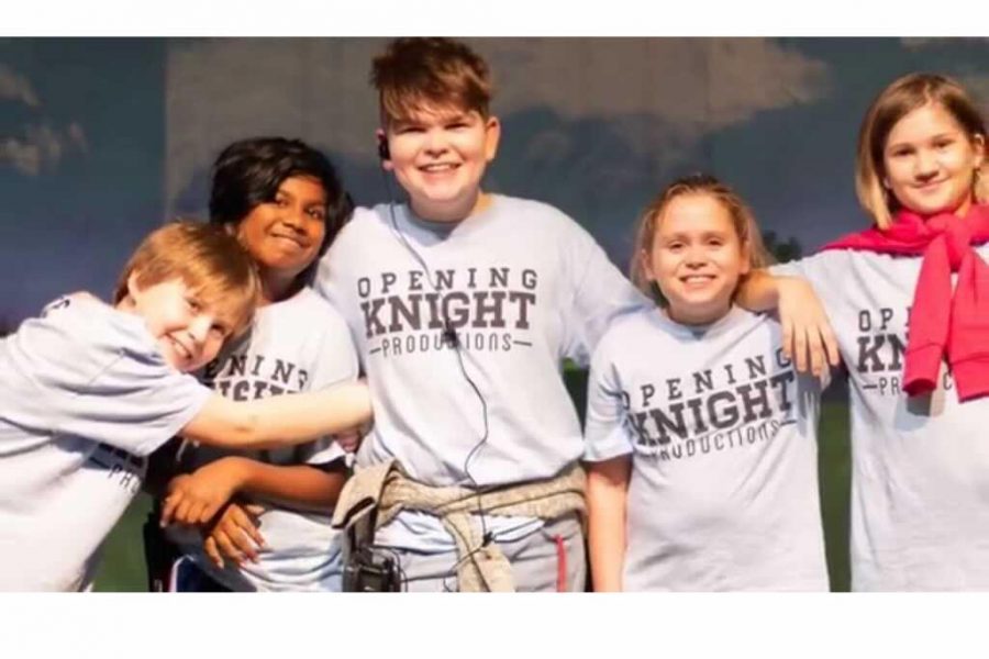 Michael Niblett poses with fellow members of the Opening Knight Production (OKP) crew after their opening night of  Aladdin Jr. at Rockwood Valley Middle School.