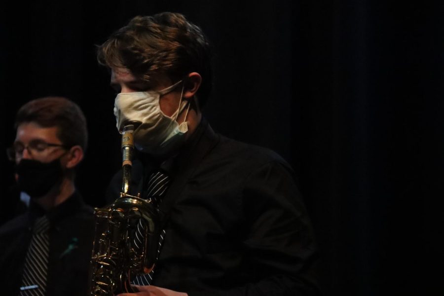 Junior Brad Allison performs a solo on the baritone saxophone in the piece C Jam Blues at the Rockwood Jazz Festival. Allison has been playing with the jazz band for three years. “I prefer C Jam because I have a solo in it and it’s fun. I find mambo styles interesting, Allison said.