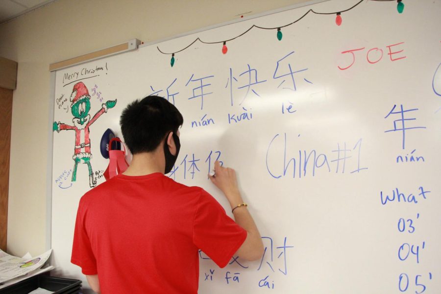 During AcLab on Feb. 1, Asian American Association met to celebreate Lunar New Year. One of the club presidents, senior Ethan Xu, prepared snacks and activities for members. Along with writing Chinese characters, called Hanzi, and creating paper lanterns.  