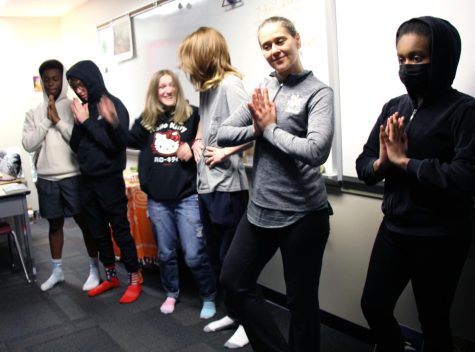 Language arts teacher Tracy Gladden teaches students yoga during the second mod of AcLab. She uses yoga to help students learn methods for coping with stress. 