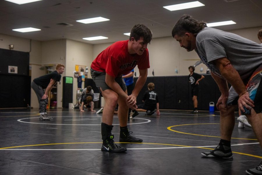 Lane prepares to engage in a friendly skirmish during a wrestling practice in Nov. 2020. Lane would go on to win a District championship and take third place in the 120-pound weight class in the Class 4 Sectional Tournament in Feb. 2021. 