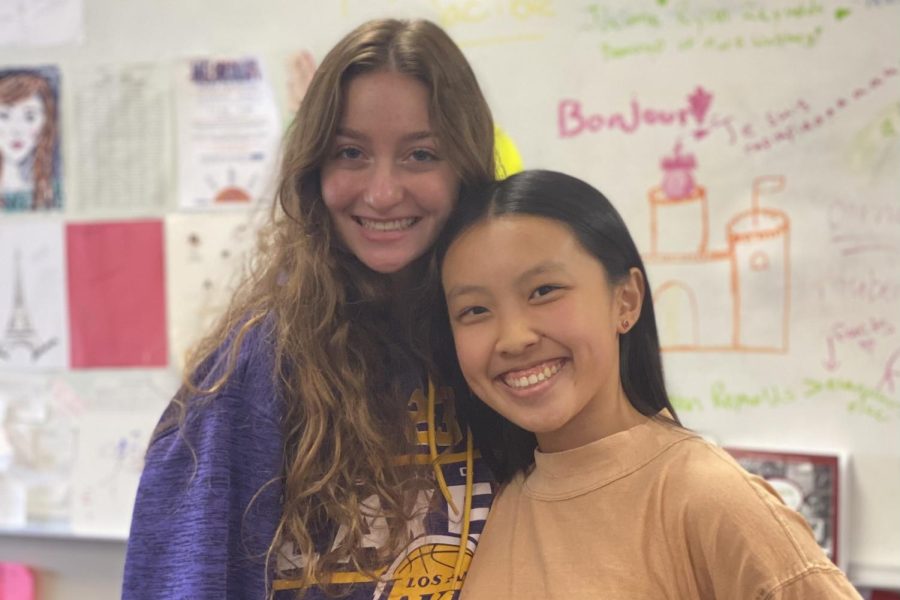 Seniors Julia Harstick (left) and Megan Liu (right) smile with each other during Emmanuelle Tamaroffs 4th Hour AP French class.