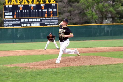 Junior Sam Williams pitches against Eureka May 4. Williams pitched a complete game and the Lancers outhit Eureka with 10 hits compared to six hits. The Lancers ended the regular season with a record of 14-15. 