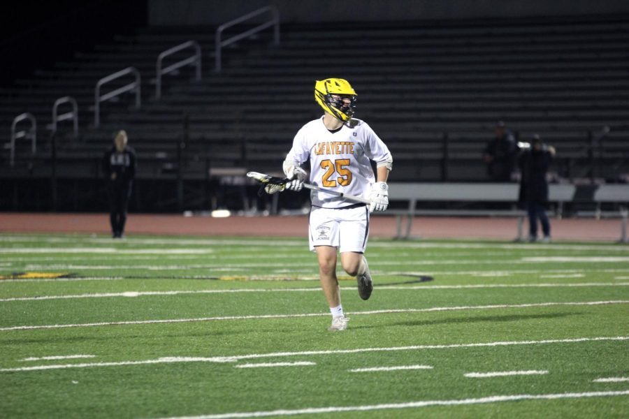 Freshman Jake Behl looks for an open teammate to pass the ball to during the Lancers game against Kirkwood April 26. The Lancers have had success against Kirkwood, with the Lancers having a 6-4 overall record against Kirkwood after the April 26 game. 