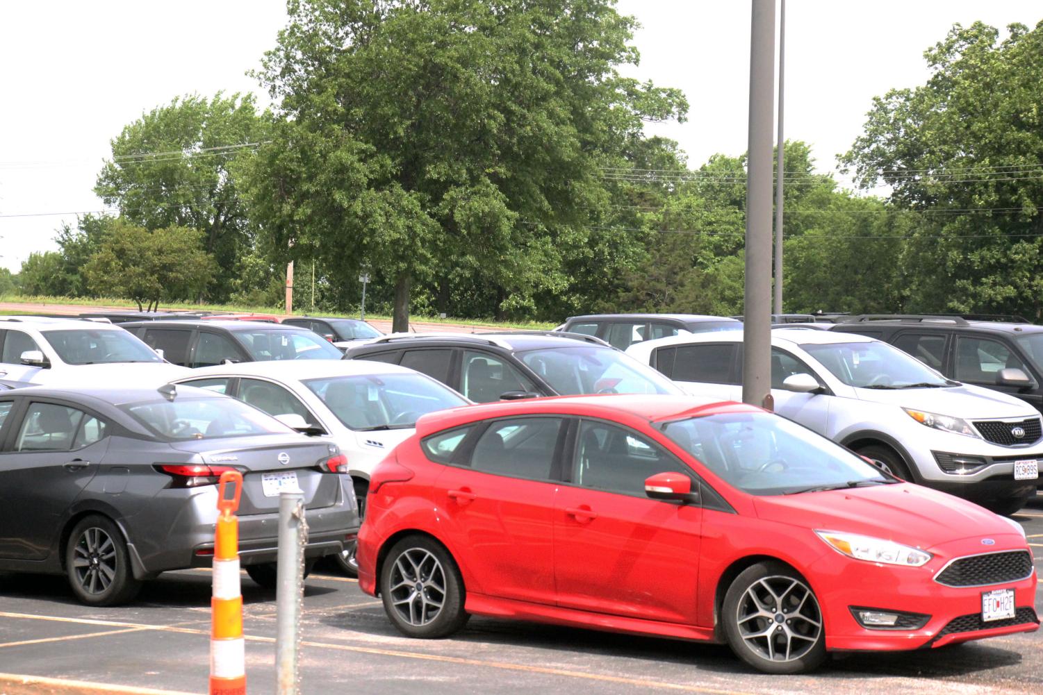 The west parking lot is full of cars during the school day. Starting on Aug. 1, seniors will have the chance to purchase their parking spot, and can choose it on May 16.