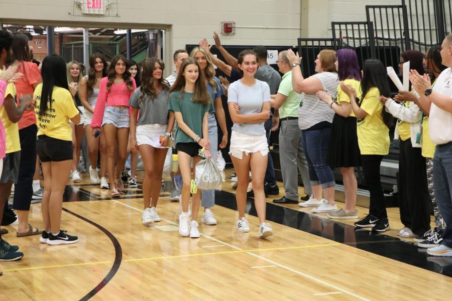 As Link Crew and LHS staff members applaud, freshmen walk into the gym to begin freshmen orientation. Assistant Principal Colleen Fields said the shift from middle school to high school can be challenging for some freshmen, but they should still try to be gentle with themselves.  Youre gonna make a lot of mistakes. Youre gonna learn a lot of new things and sometimes youre gonna feel overwhelmed,” Fields said. 