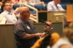 Phil Milligan speaks against Jessica Clarks comments during Patron Comments at the Sept. 1 Board meeting. Milligan was a band teacher at Lafayette for 11 years before he became an elementary school principal. He strongly opposed Clarks remarks. Shame on you, he said towards her.